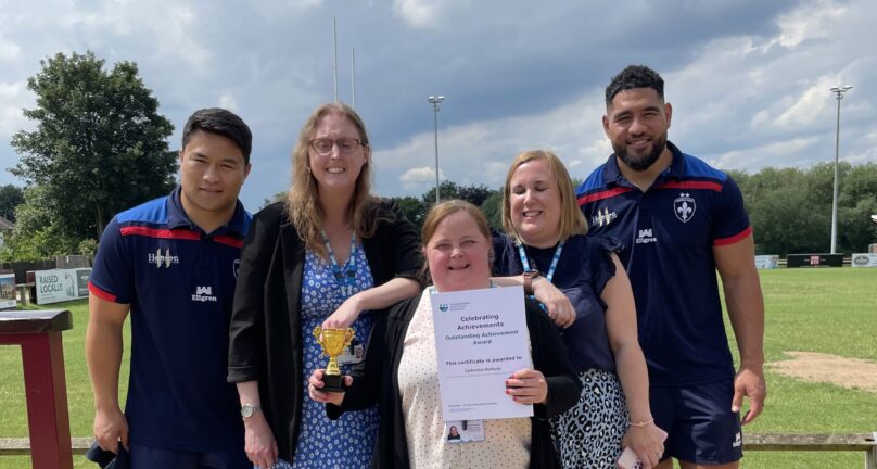 Award winner Cath Horbury alongside Wakefield Trinity players Mason Lino and Kelepi Tanginoa, Senior Commissioning Manager Charlotte Winter and Improvement Support Officer Chloe Tankard