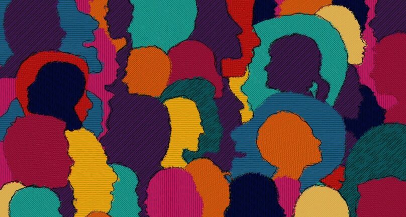 An image with the outline of lots of people in different colours. It is reflecting the diversity of people.